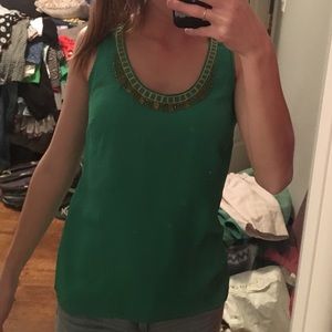 Green shirt with beaded neck line